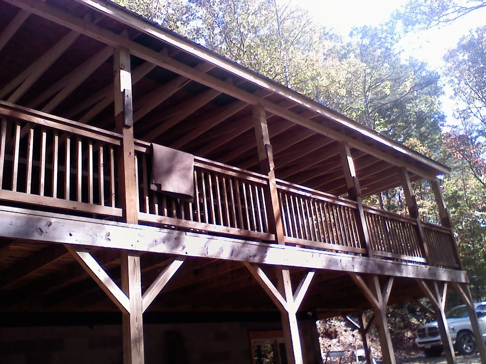 Timber framing under a new elevated porch and deck — Roof Leak Repair in Erick by Roofing Brothers